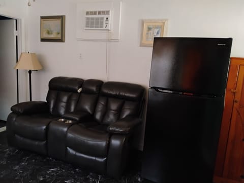 Living room with reclining loveseats 