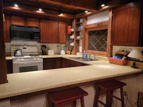 Dining room looking back into kitchen