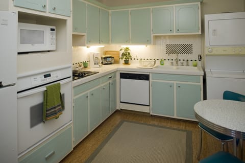 Kitchen with small two-chair table.