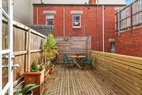 Enjoy your morning coffee or meals outdoors on the furnished deck adjacent to the kitchen.