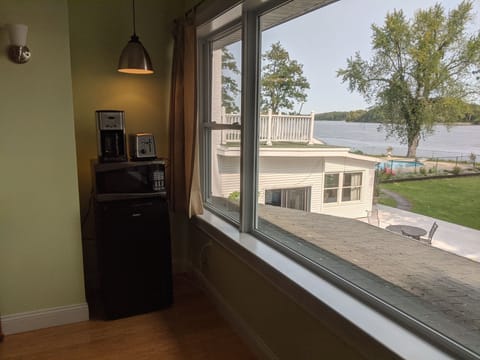 Mini fridge, coffee maker, toaster and microwave with a view