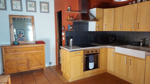 Large, fully equipped kitchen with electric fan oven, hotplate and dishwasher