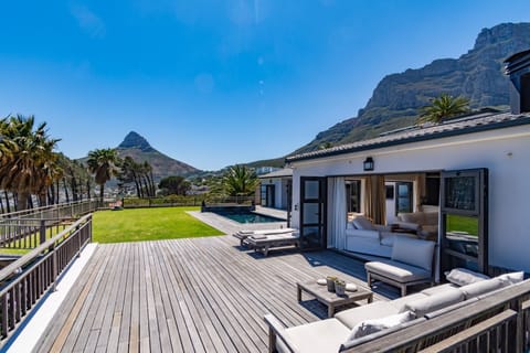 Stunning sun deck with comfortable outdoor furniture, views of iconic Lion Head