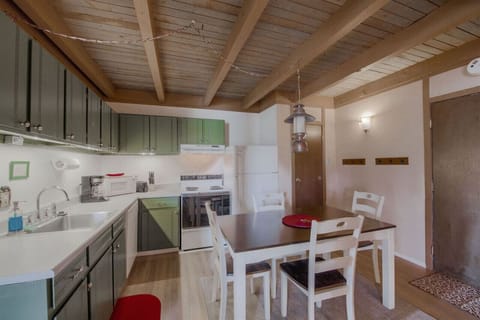 The intimate dining and kitchen area makes spending meal time together a breeze