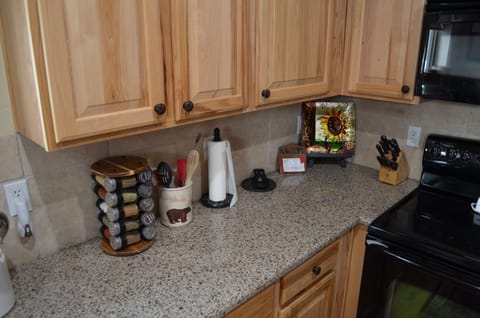 Spices, oils and other cooking supplies on hand for your convenience.  