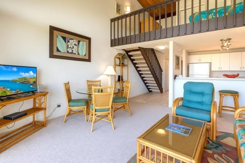 Where warm wood beams meet ocean blues—this breezy retreat invites you to unwind in timeless island comfort