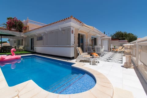 View of villa and private heated pool