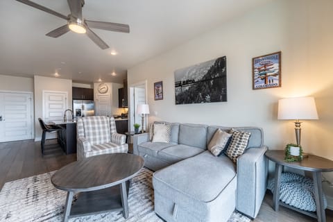 Living area offering cozy furnishings, a smart TV, and a gas fireplace.