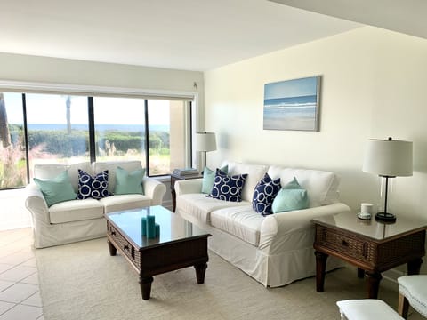Comfy, new pottery barn couches and calming blue touches.