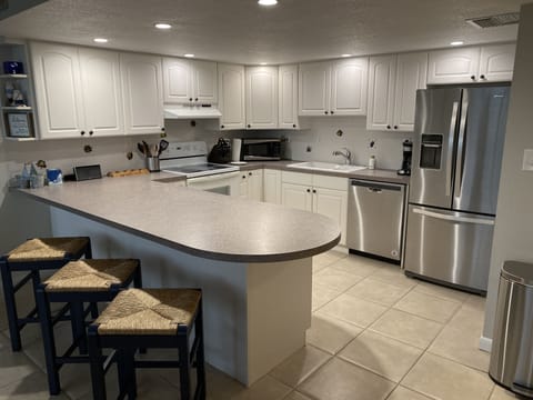 Spacious kitchen with everything you need for your stay.