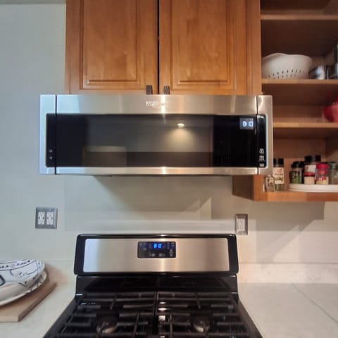 5 Burner Gas Stove and microwave.
