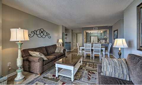 Spacious, open concept living room, dining table and kitchen