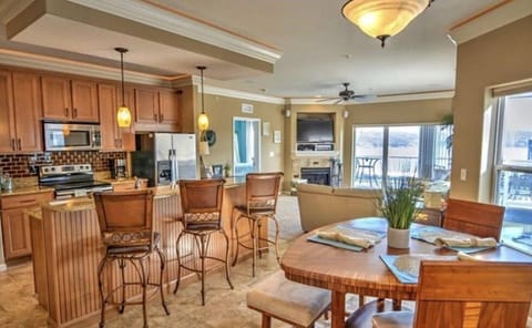 Once a model unit, clean, bright & custom features throughout! Update: 4 chairs