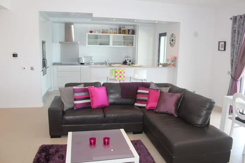 Open plan spacious living/dining/kitchen area with direct access to main terrace