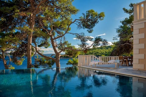 A magical view of the beautiful blue sky from the spacious outdoor terrace of the luxury vacation villa Brač