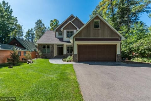 Front entrance with tree lined driveway