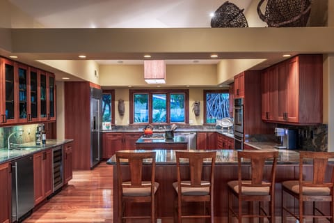 gourmet kitchen and indoor dining