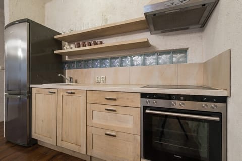 Fully-equipped kitchen in beachfront luxury villa on Brač with pool for vacation and rent.