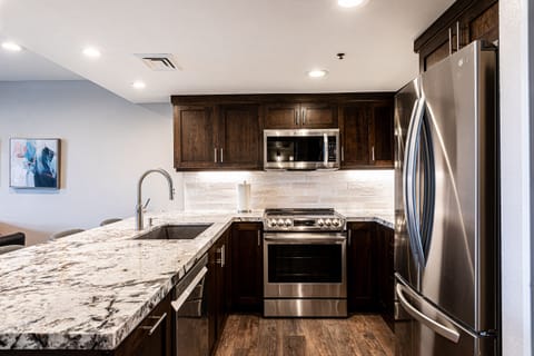 Full Kitchen with custom cabinetry and stunning granite counters 