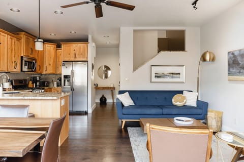 View of living, dining and kitchen area from river