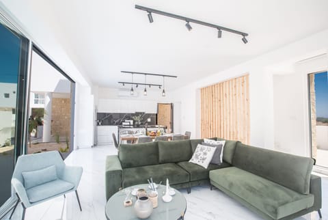 Living room with comfortable corner sofa and Smart TV