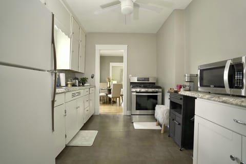 Kitchen - new stove, microwave and keurig.  Stocked with coffee grinds & kcups