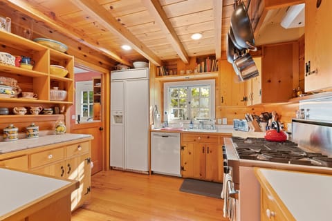 Kitchen includes a Viking gas range and large convection oven