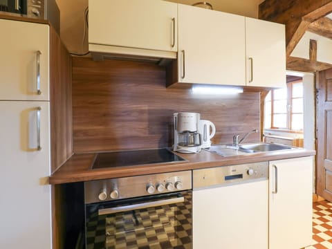 Cabinetry, Countertop, Property, Kitchen Sink, Furniture, Building, Kitchen Appliance, Kitchen, Kitchen Stove, Wood