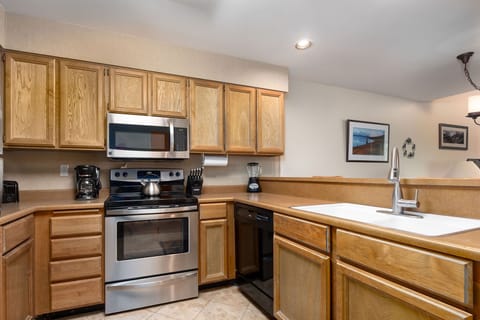 Fully equipped kitchen with stainless-steel appliances