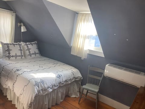 Second bedroom with queen-sized bed with memory foam topper