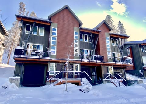 Middle Unit townhome with attached garage and beautiful morning sunlight