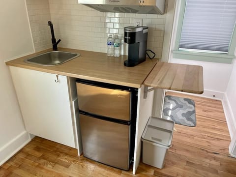 Drop leaf cutting board table for extra space