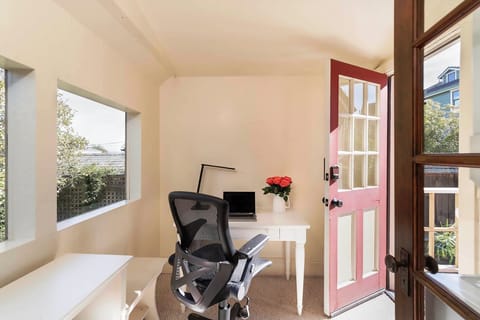 Office area with door to the back yard