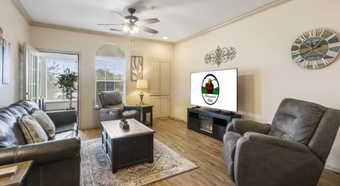 Living Space with Cable TV, Fireplace, Sleeper Sofa, and Sunroom Access