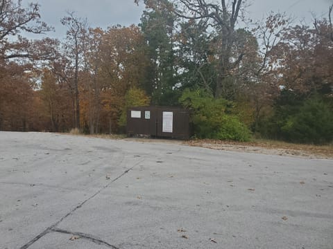 Community dumpster at the top of the hill on Cherry Blossom and Apple Blossom.