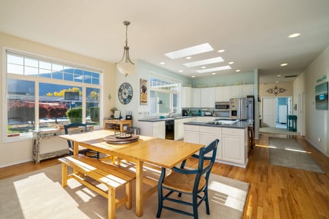 Dining and kitchen area looks out into the courtyard