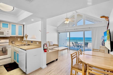 Coconuts Beachfront 109 by AMI Locals