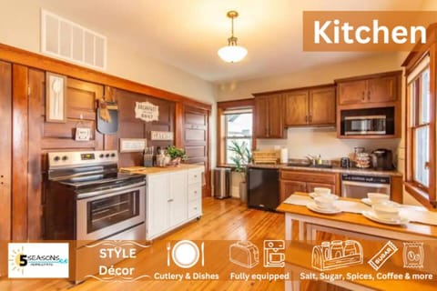 Step into the meticulously decorated, fully equipped, and organized downstairs kitchen, where culinary magic awaits.