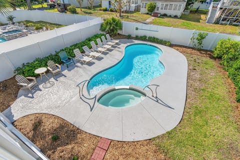 Take a dip in this sparkling pool after a fun day at the beach!