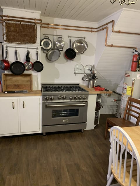 6 burner industrial stove hanging pots & pans to create memoriable meals 
