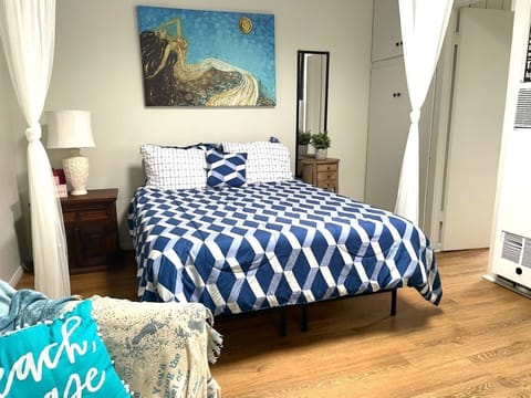 Beach themed room with Queen bed, perfect spot to unwind!