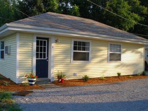 Single Cottage is the full building with 2 bedrooms and 1 bathroom.  NOTE: It also has a front patio with 2 chairs that is not shown in this photo.