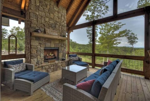 Cozy Main level deck with gas fireplace. 