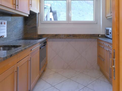 Countertop, Property, Room, Kitchen, Tile, Floor, Cabinetry, Furniture, Flooring, Real Estate