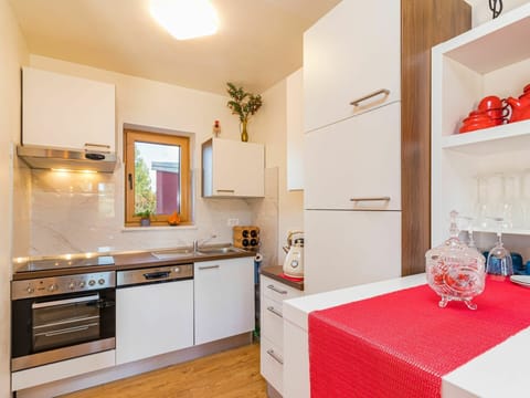 Room, Property, Furniture, Kitchen, Countertop, Interior Design, Cabinetry, Building, House, Floor