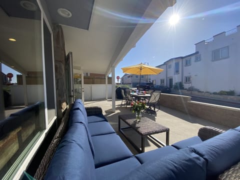 2 houses to the sand. Lots of dining space and Gas BBQ