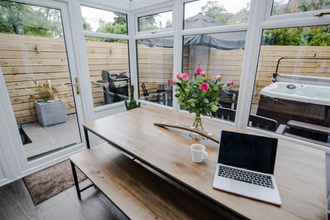 Dining conservatory, fully tiled with under-floor heating
