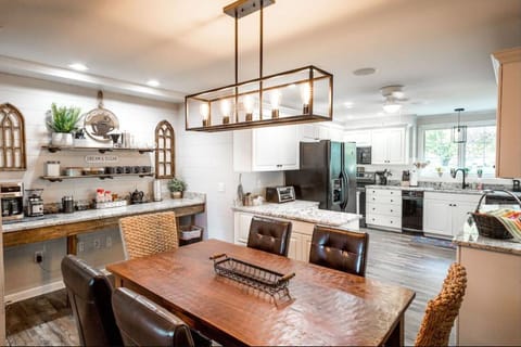 Another angle  of this same kitchen, both kitchens include a coffee bar.