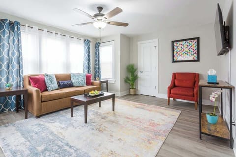 Spacious Living Room with large screen HDTV