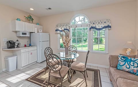 Kitchenette with full Fridge and Microwave, dishes or quick meal